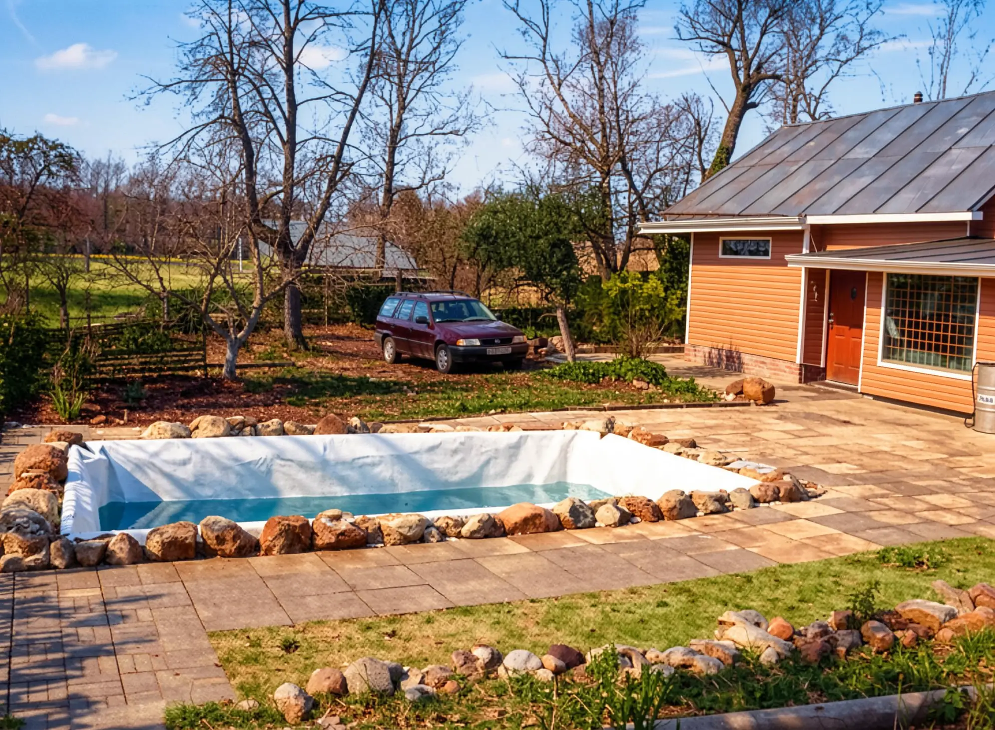 DIY swimming pool from old car tires at cottage
